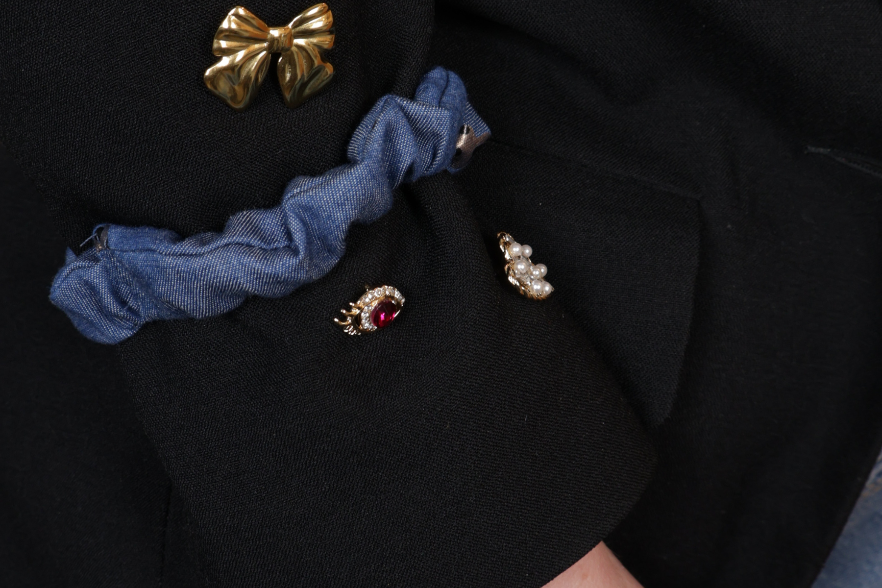 Sleeve holders are back: how to style this handy accessory