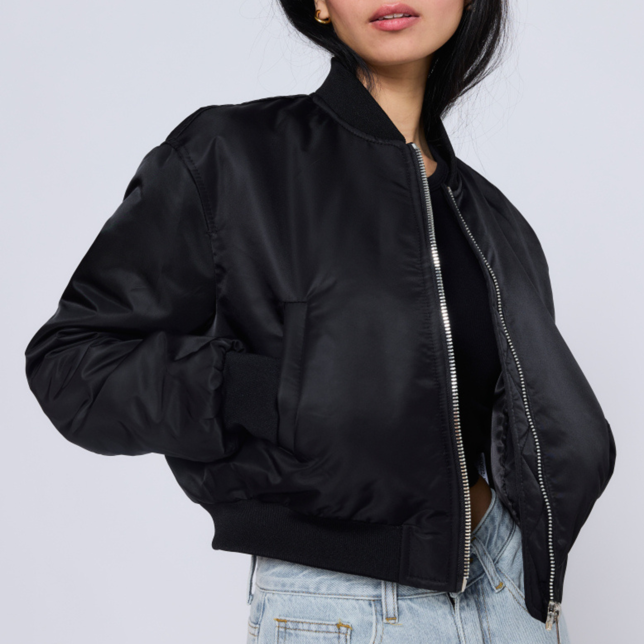 Black bomber jacket with zip and pockets