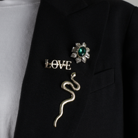 20047 pin gold snake on blazer
