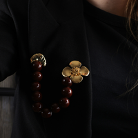 20050 pin gold croissant flower with brown beads
