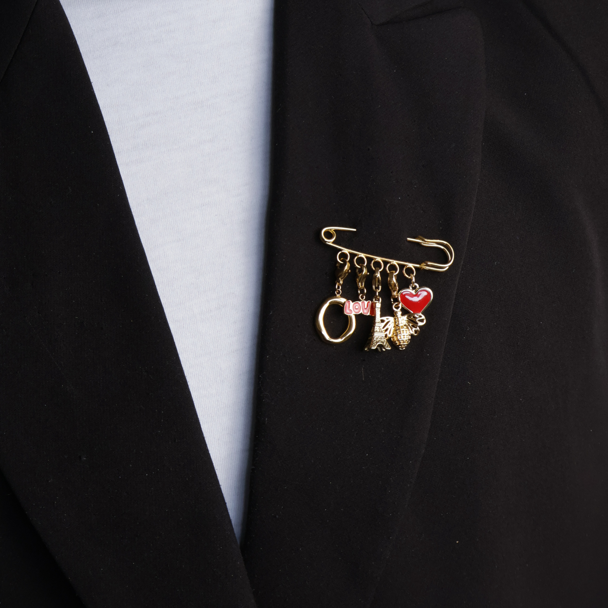 Gold safety pin with red pendants paris vibes